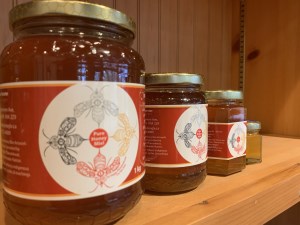 jars of honey shown in various sizes